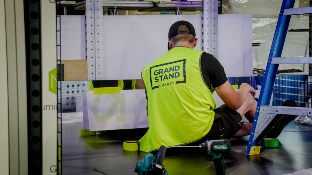 GSE Team applying branded decal 