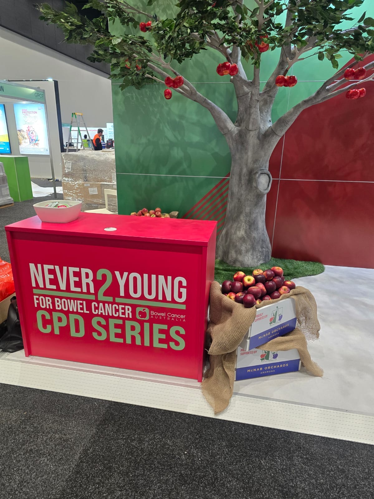 gpce 2025 – bowel cancer aus exhibition stand with custom tree