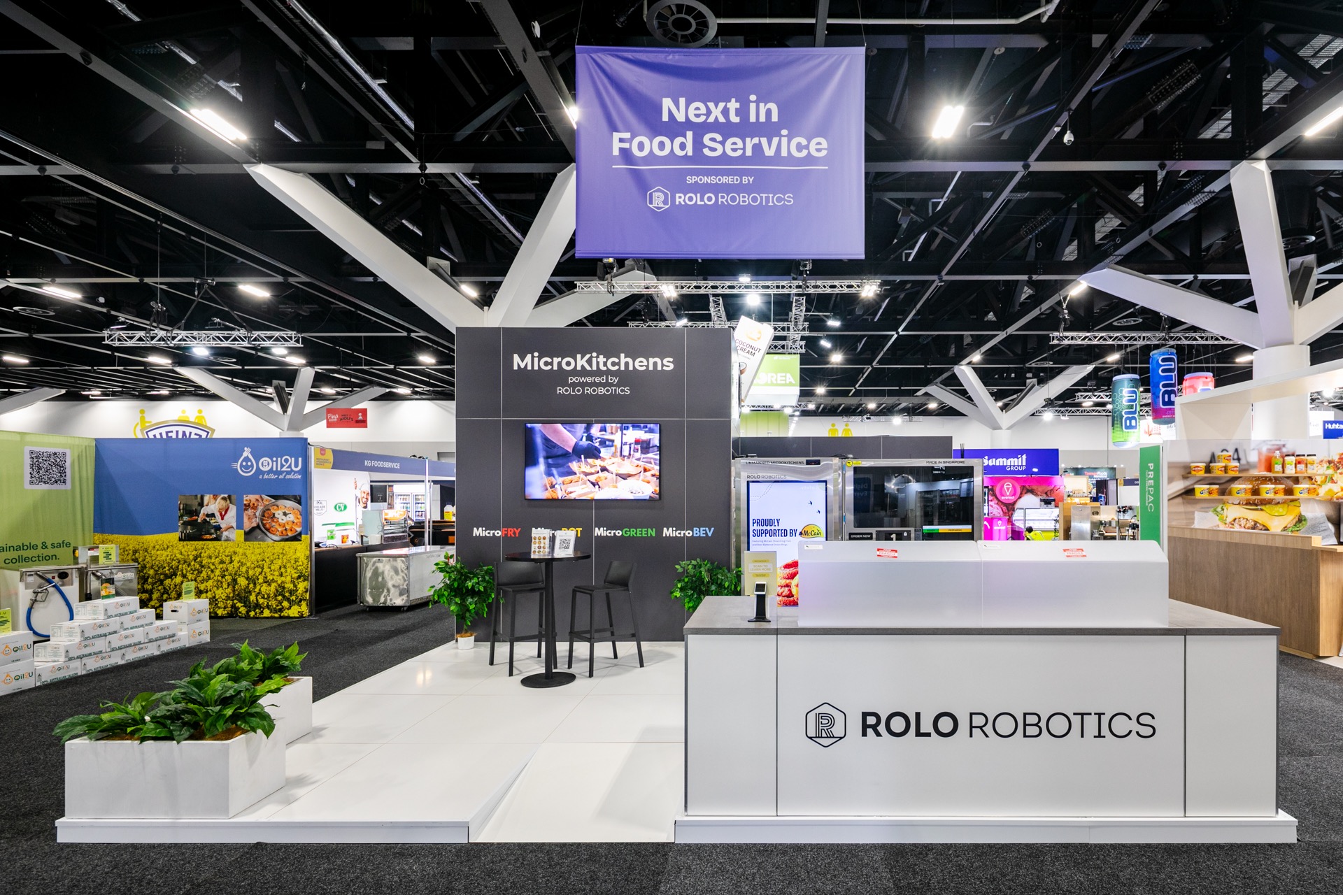 an exhibition stand showing smart use of space for product sampling, live demo and conversation space